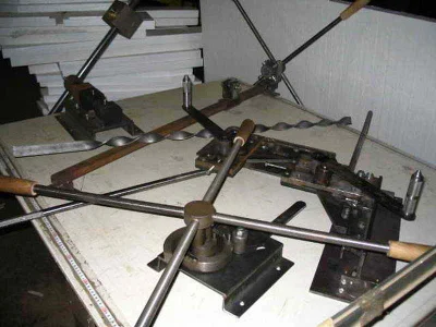 Drawings of machines for cold forging.