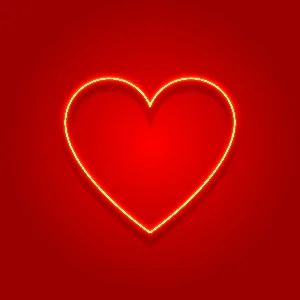 Неоновое сердце на красном градиентном размытом фоне